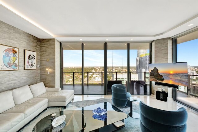 88 SW 7th St Unit 3212, Miami, FL 33130 - living room featuring floor to ceiling windows and plenty of natural light