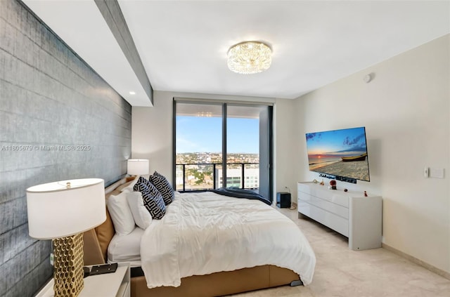 88 SW 7th St Unit 3212, Miami, FL 33130 - carpeted bedroom featuring baseboards and a chandelier