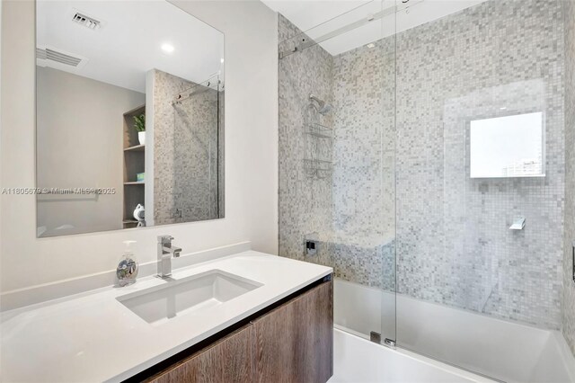 88 SW 7th St Unit 3212, Miami, FL 33130 - bathroom featuring toilet, enclosed tub / shower combo, and vanity