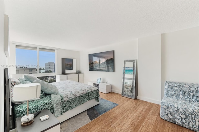 1500 S Ocean Dr Unit 7J, Hollywood, FL 33019 - bedroom featuring wood finished floors and baseboards