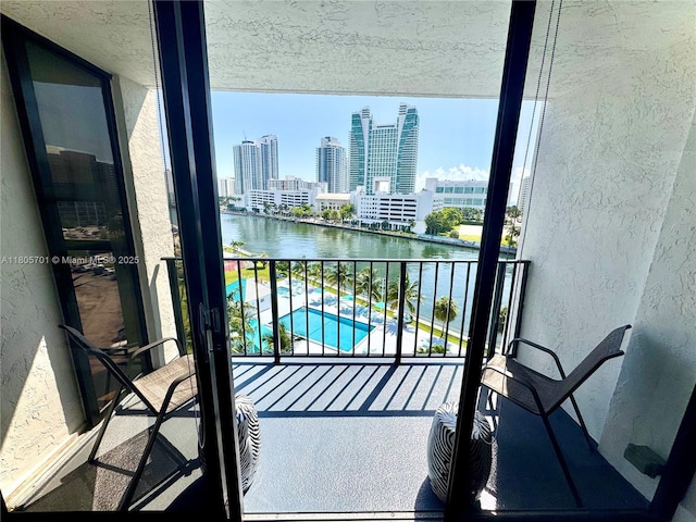 200 Leslie Dr Unit 817, Hallandale Beach, FL 33009 - balcony featuring a water view, a view of skyline, and view of pool area