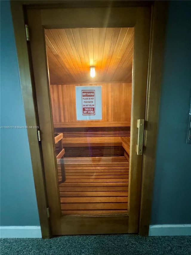 200 Leslie Dr Unit 817, Hallandale Beach, FL 33009 - sauna / steam room featuring carpet, wood ceiling, and baseboards