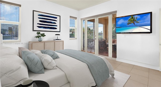 9029 SW 214th St, Cutler Bay, FL 33189 - tiled bedroom featuring access to exterior and multiple windows
