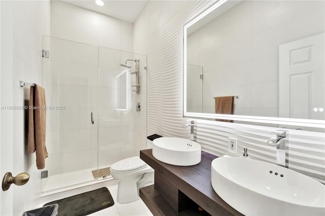 9029 SW 214th St, Cutler Bay, FL 33189 - full bath featuring a sink, tile walls, a shower stall, toilet, and backsplash