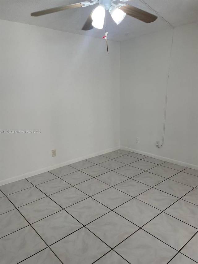 810 SW 73rd Ave Unit 9, North Lauderdale, FL 33068 - empty room featuring a ceiling fan and light tile patterned floors