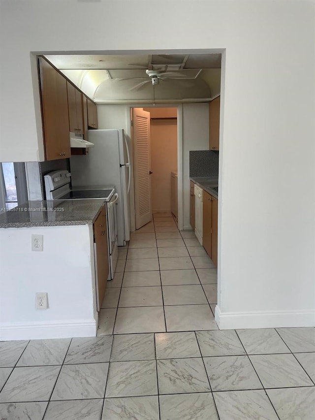 810 SW 73rd Ave Unit 9, North Lauderdale, FL 33068 - kitchen featuring electric stove, exhaust hood, a ceiling fan, dark countertops, and washer / dryer
