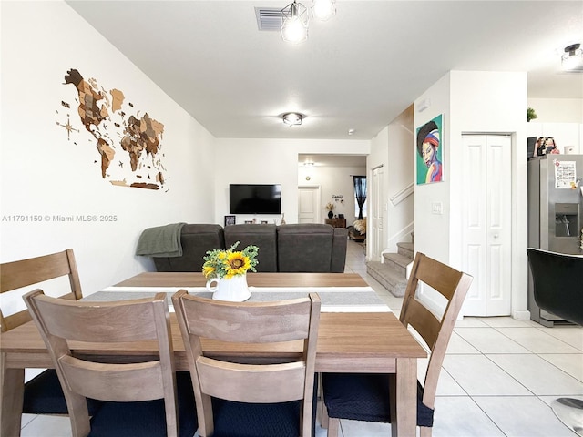 11871 SW 247th Ter, Homestead, FL 33032 - dining room featuring light tile patterned floors and stairs