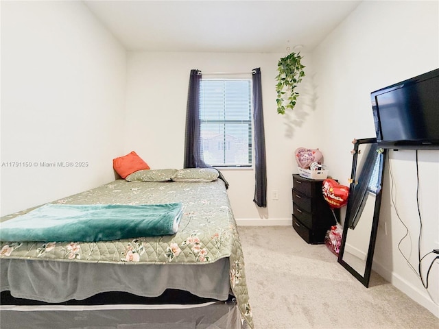 11871 SW 247th Ter, Homestead, FL 33032 - bedroom featuring light carpet and baseboards