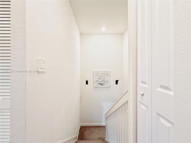 11871 SW 247th Ter, Homestead, FL 33032 - staircase with baseboards and a textured wall