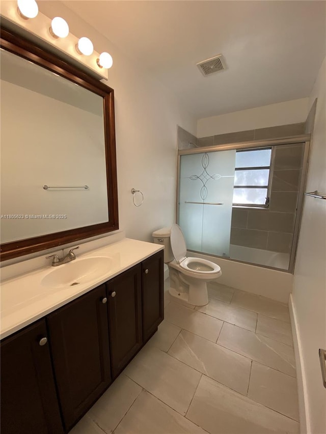 5746 Polk St, Hollywood, FL 33021 - bathroom with vanity, toilet, and enclosed tub / shower combo