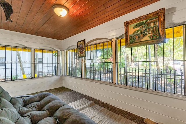 5437 NW 4th Ave, Miami, FL 33127 - sunroom with wood ceiling, plenty of natural light, and wood walls