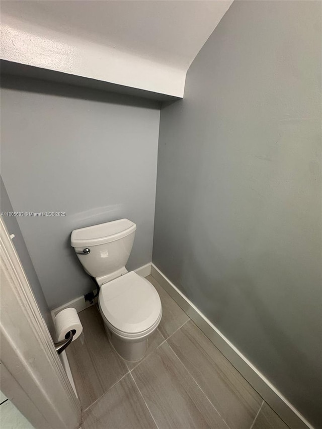 12605 SW 54th Ct Unit 12605, Miramar, FL 33027 - bathroom with toilet and baseboards