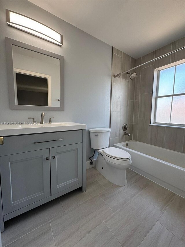 12605 SW 54th Ct Unit 12605, Miramar, FL 33027 - bathroom with toilet, vanity, and bathing tub / shower combination