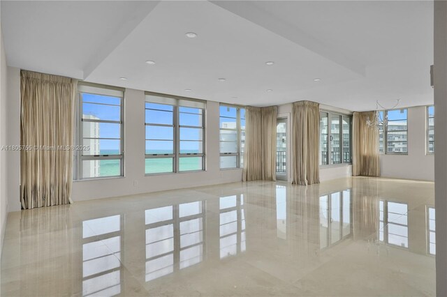 5660 Collins Ave Unit 15B, Miami Beach, FL 33140 - spare room with plenty of natural light and recessed lighting