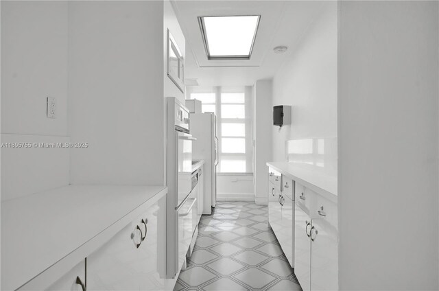 5660 Collins Ave Unit 15B, Miami Beach, FL 33140 - bathroom featuring baseboards