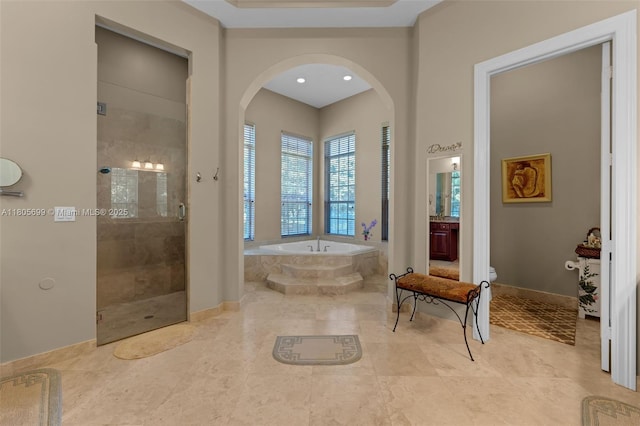 31725 SW 213th Ave, Homestead, FL 33030 - bathroom featuring a bath, toilet, a stall shower, baseboards, and recessed lighting