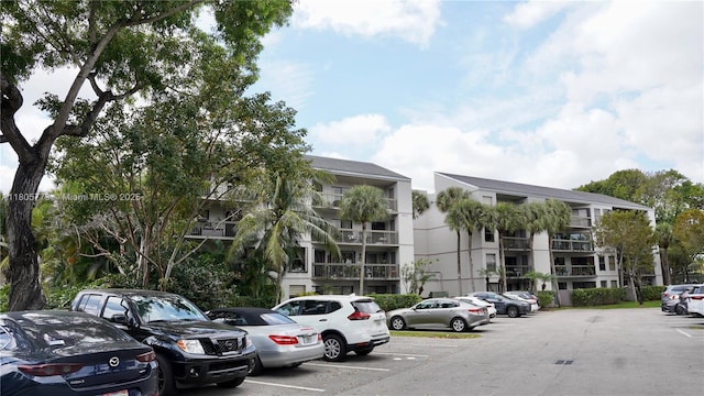 8810 SW 132nd Pl Unit 303Dn, Miami, FL 33186 - view of apartment building / complex with uncovered parking