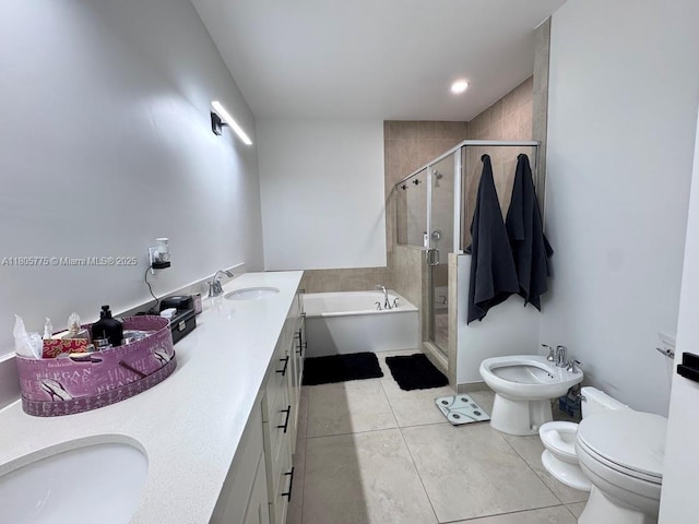 full bathroom featuring a bidet, toilet, a shower stall, tile patterned floors, and a garden tub