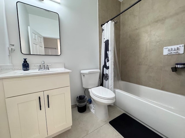 bathroom with toilet, vanity, tile patterned floors, baseboards, and shower / bath combo with shower curtain