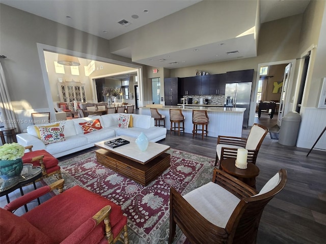 living area with dark wood-style flooring