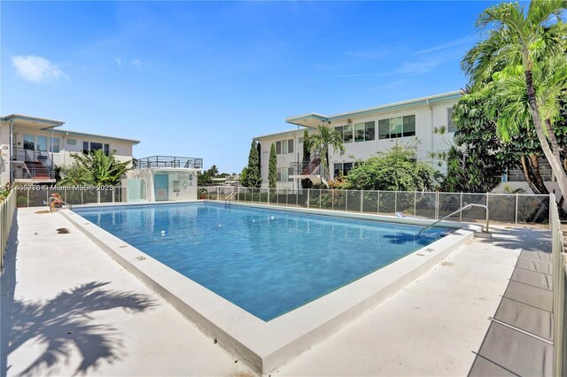 4710 Pine Tree Dr Unit 31, Miami Beach, FL 33140 - community pool with fence