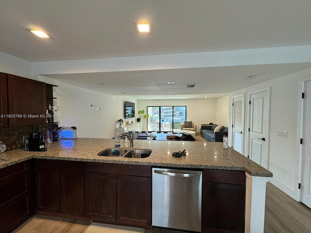 3720 NE 167th St Unit 39, North Miami Beach, FL 33160 - kitchen with stainless steel dishwasher, a sink, light wood-type flooring, dark brown cabinetry, and recessed lighting