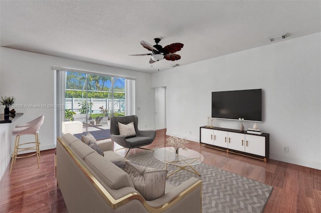10730 NW 56th Ct, Coral Springs, FL 33076 - living room featuring wood finished floors and a ceiling fan