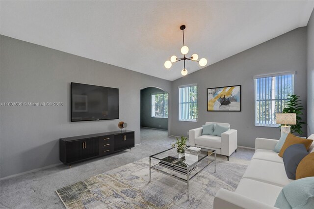 10730 NW 56th Ct, Coral Springs, FL 33076 - living area with light carpet, arched walkways, vaulted ceiling, and a chandelier