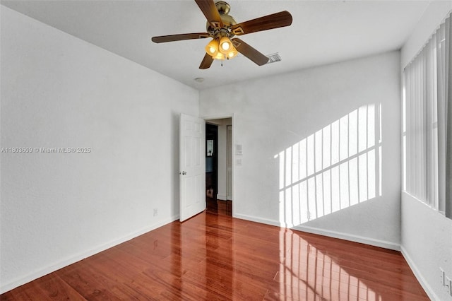 10730 NW 56th Ct, Coral Springs, FL 33076 - empty room with wood finished floors and ceiling fan