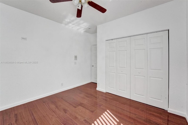10730 NW 56th Ct, Coral Springs, FL 33076 - unfurnished bedroom featuring wood finished floors, a closet, and a ceiling fan