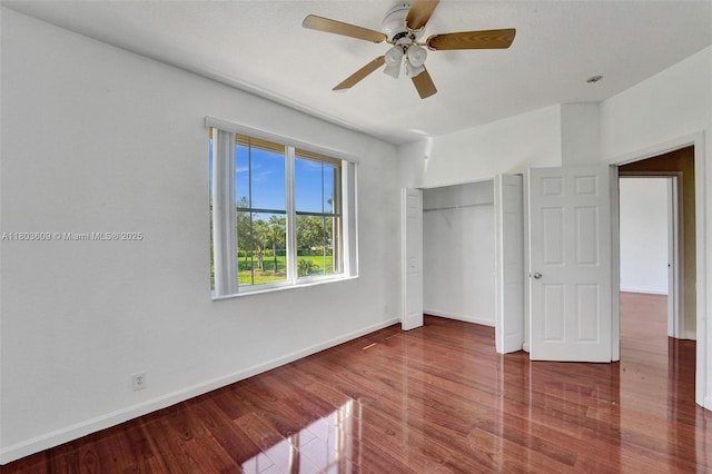 10730 NW 56th Ct, Coral Springs, FL 33076 - unfurnished bedroom featuring wood finished floors, a closet, and a ceiling fan