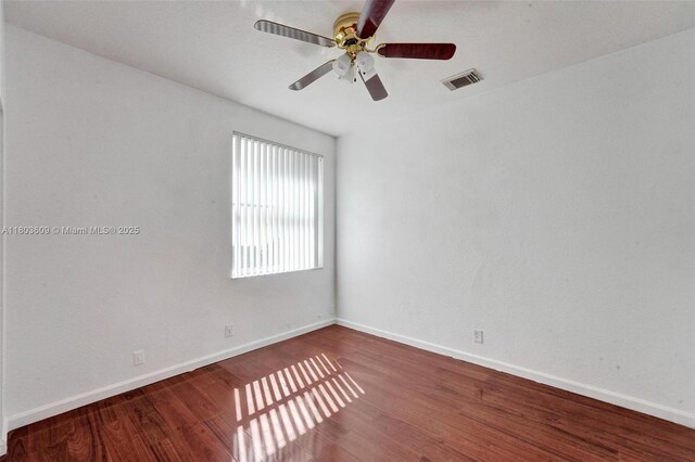 10730 NW 56th Ct, Coral Springs, FL 33076 - unfurnished room with wood finished floors and ceiling fan