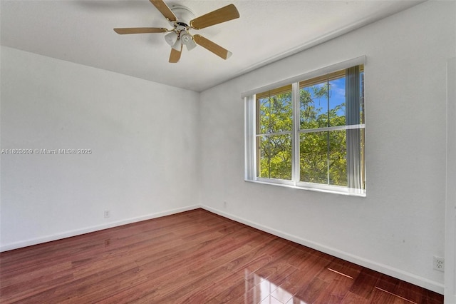 10730 NW 56th Ct, Coral Springs, FL 33076 - empty room featuring wood finished floors and ceiling fan