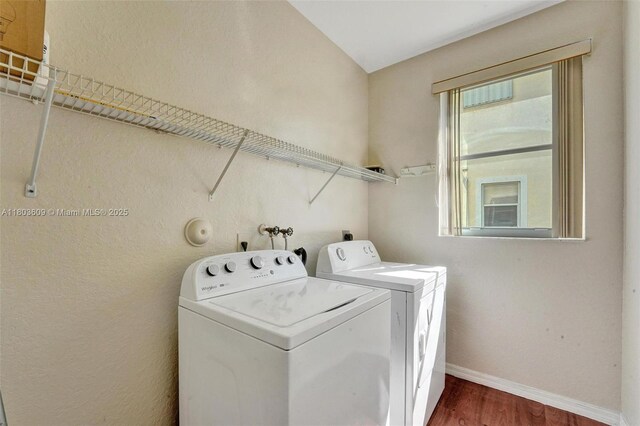 10730 NW 56th Ct, Coral Springs, FL 33076 - washroom with independent washer and dryer and wood finished floors
