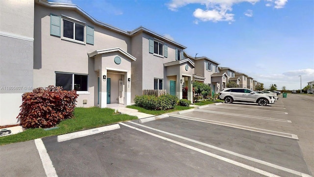 388 NW 12th Pl Unit 388, Florida City, FL 33034 - uncovered parking lot with a residential view