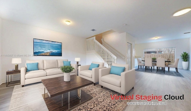 388 NW 12th Pl Unit 388, Florida City, FL 33034 - living area featuring wood finished floors and stairs