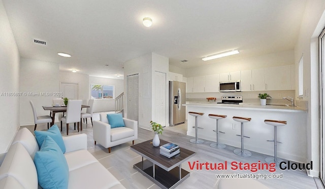 388 NW 12th Pl Unit 388, Florida City, FL 33034 - living room featuring light wood-style floors