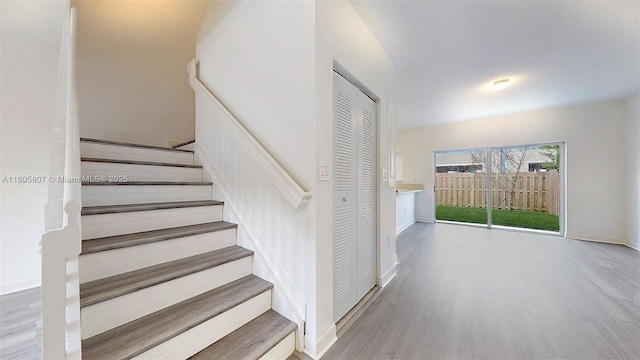 388 NW 12th Pl Unit 388, Florida City, FL 33034 - stairway featuring wood finished floors and baseboards