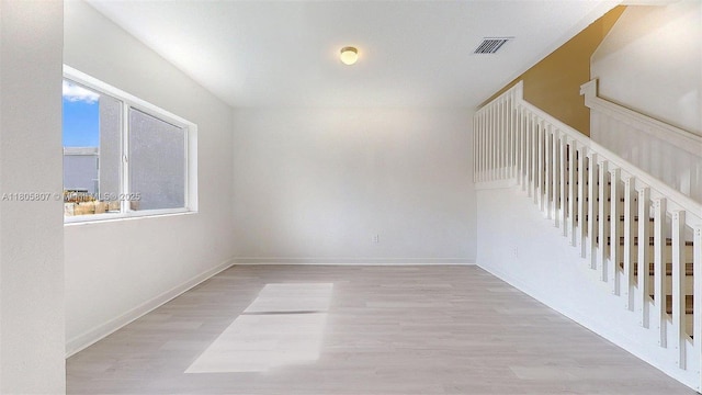 388 NW 12th Pl Unit 388, Florida City, FL 33034 - unfurnished living room featuring wood finished floors and baseboards