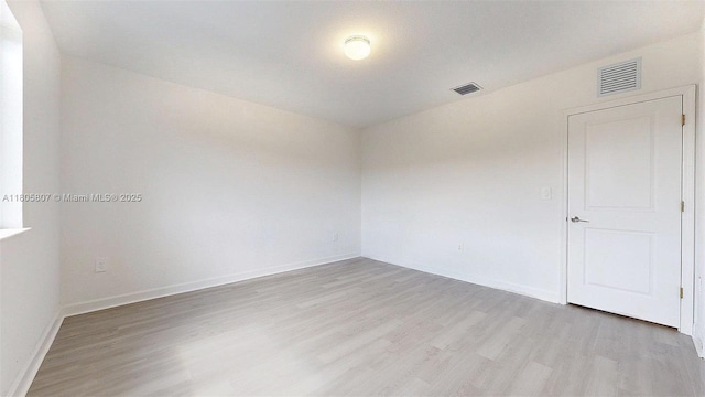 388 NW 12th Pl Unit 388, Florida City, FL 33034 - empty room featuring light wood-style floors and baseboards