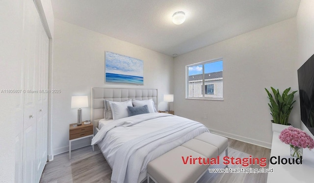 388 NW 12th Pl Unit 388, Florida City, FL 33034 - bedroom featuring wood finished floors and baseboards