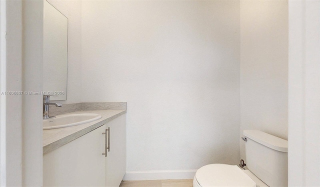 388 NW 12th Pl Unit 388, Florida City, FL 33034 - bathroom with toilet, vanity, and baseboards