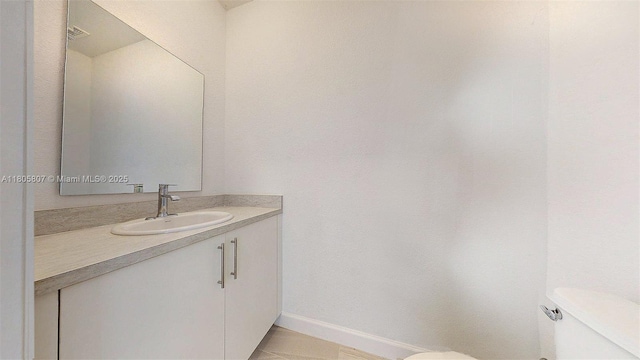 388 NW 12th Pl Unit 388, Florida City, FL 33034 - half bath with toilet, vanity, and baseboards
