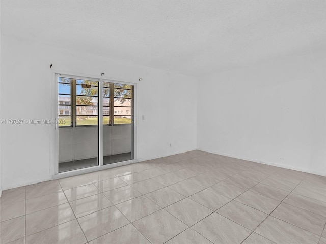 374 Tilford R Unit 374, Deerfield Beach, FL 33442 - empty room featuring tile patterned flooring