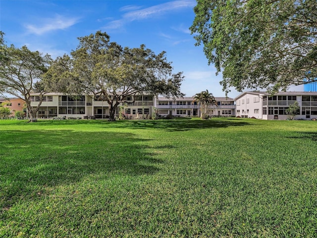 374 Tilford R Unit 374, Deerfield Beach, FL 33442 - view of property's community with a lawn