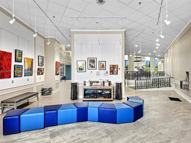 374 Tilford R Unit 374, Deerfield Beach, FL 33442 - building lobby with ornamental molding and a drop ceiling