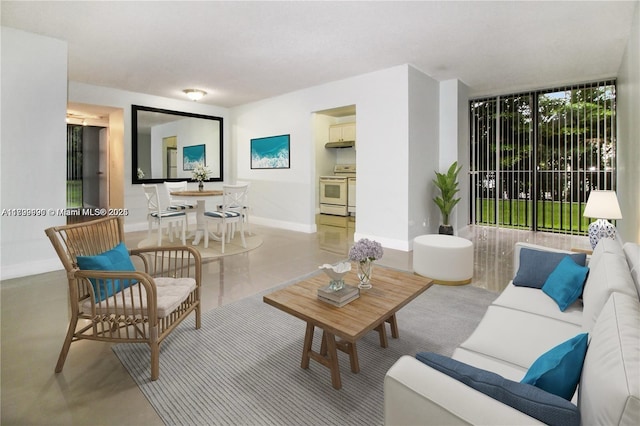 17021 N Bay Rd Unit 105, Sunny Isles Beach, FL 33160 - living area featuring baseboards