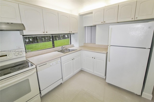 17021 N Bay Rd Unit 105, Sunny Isles Beach, FL 33160 - kitchen featuring white appliances, under cabinet range hood, light countertops, and white cabinetry