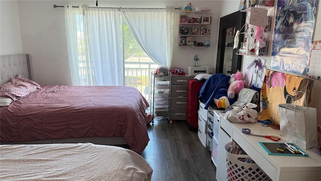 bedroom featuring wood finished floors
