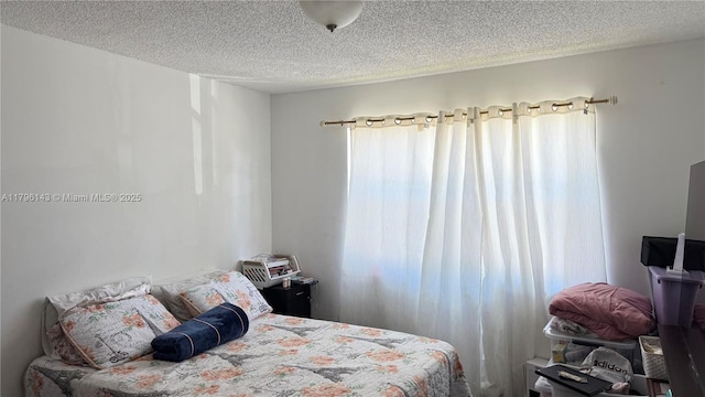 bedroom with a textured ceiling